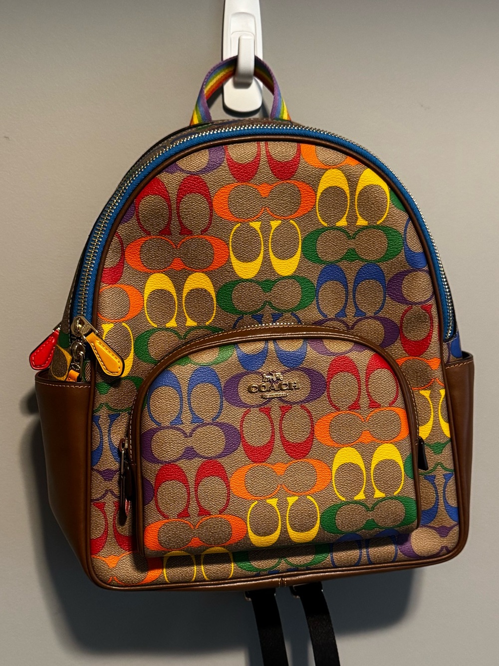 Coach Court Backpack in Rainbow Signature Canvas from Coach’s Pride Collection